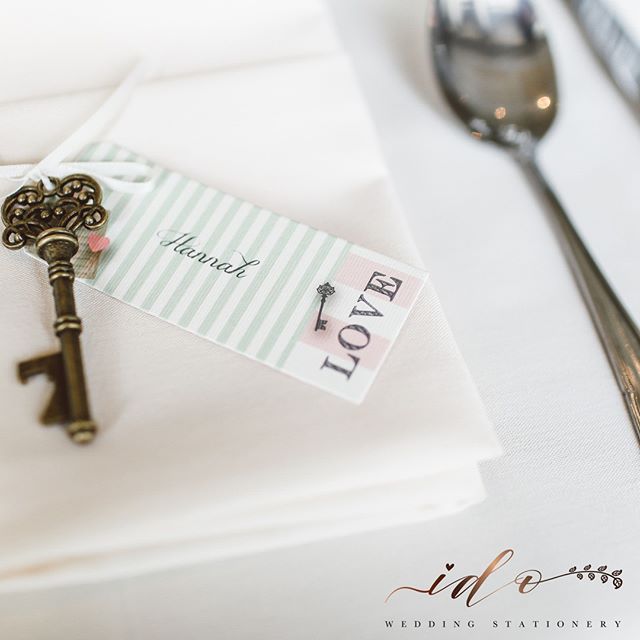 Guest Table name cards don’t have to be ‘just a card’ Think about an option that includes an item they can save as a keepsake from your day. This Tag on a key would look lovely hanging on a hook in their home, to remind them of the most beautiful day spent at your wedding-online